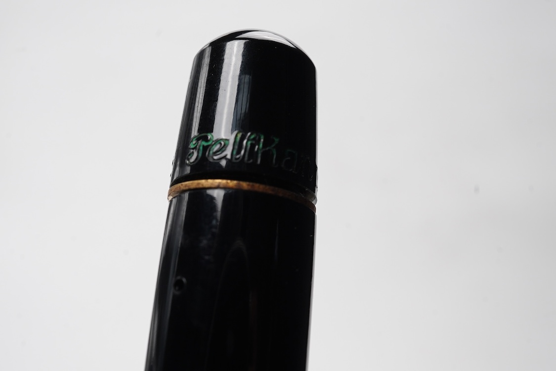 A Pelikan 100N fountain pen fitted with a 14ct. gold Pelkan nib